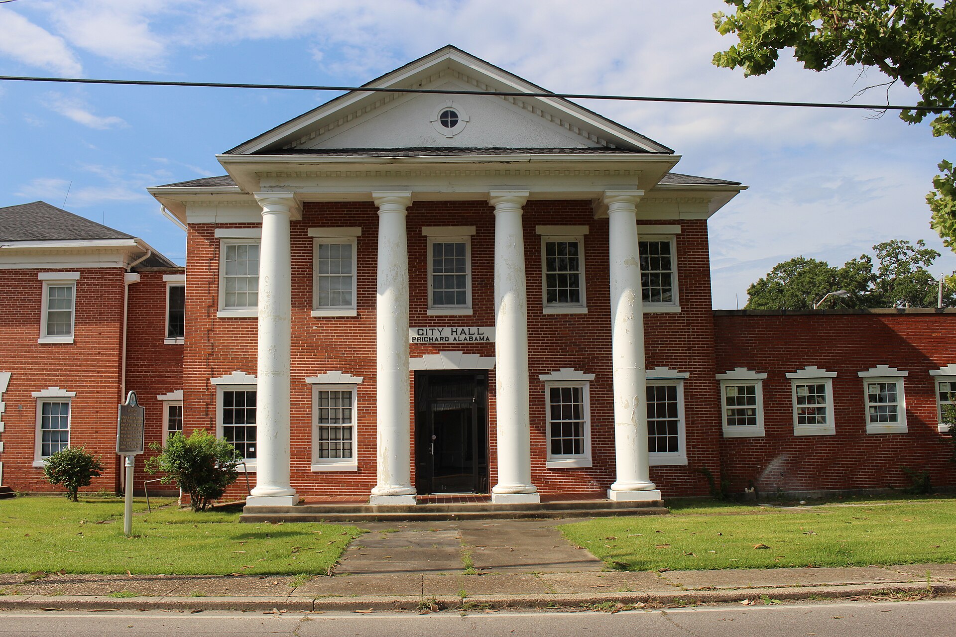 The former City Hall in Prichard, Alabama, a red-brick building with a white-columned portico.